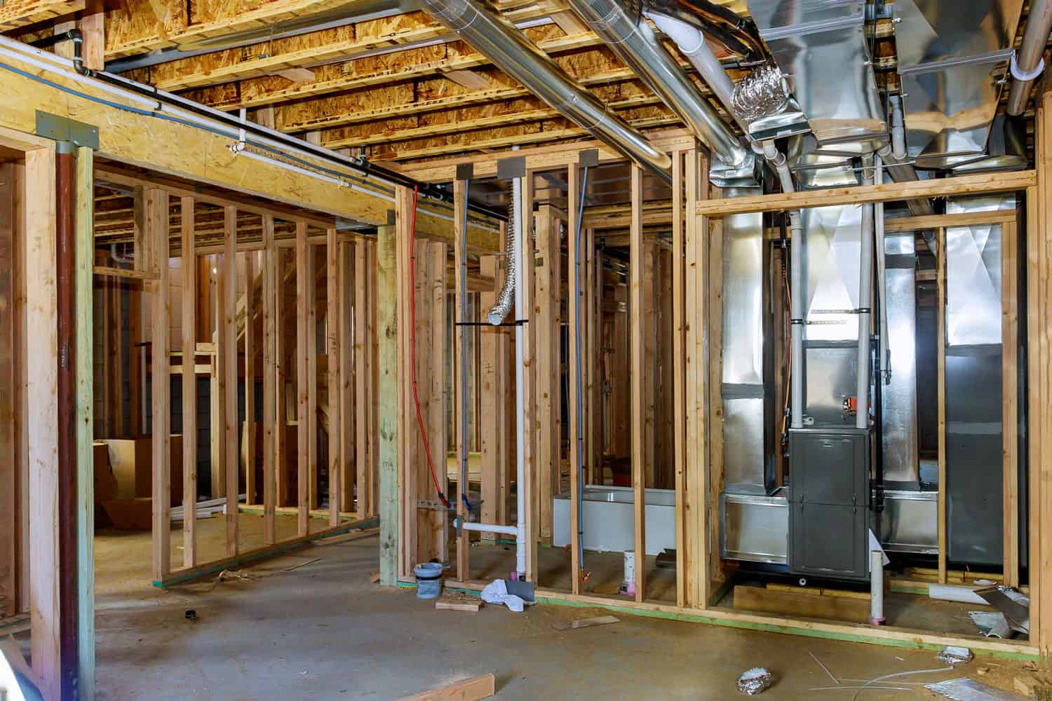 Interior view of a basement under construction home framing beam in home heating system