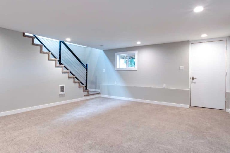 Light spacious basement area with staircase
