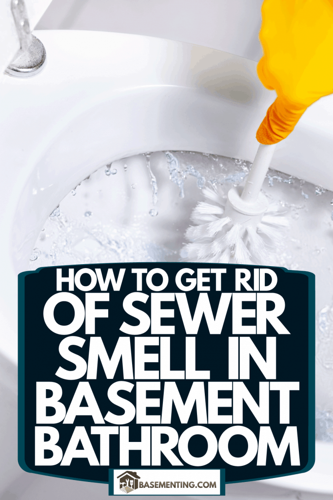 A woman wearing a glove while cleaning the toilet bowl, How To Get Rid Of Sewer Smell In Basement Bathroom