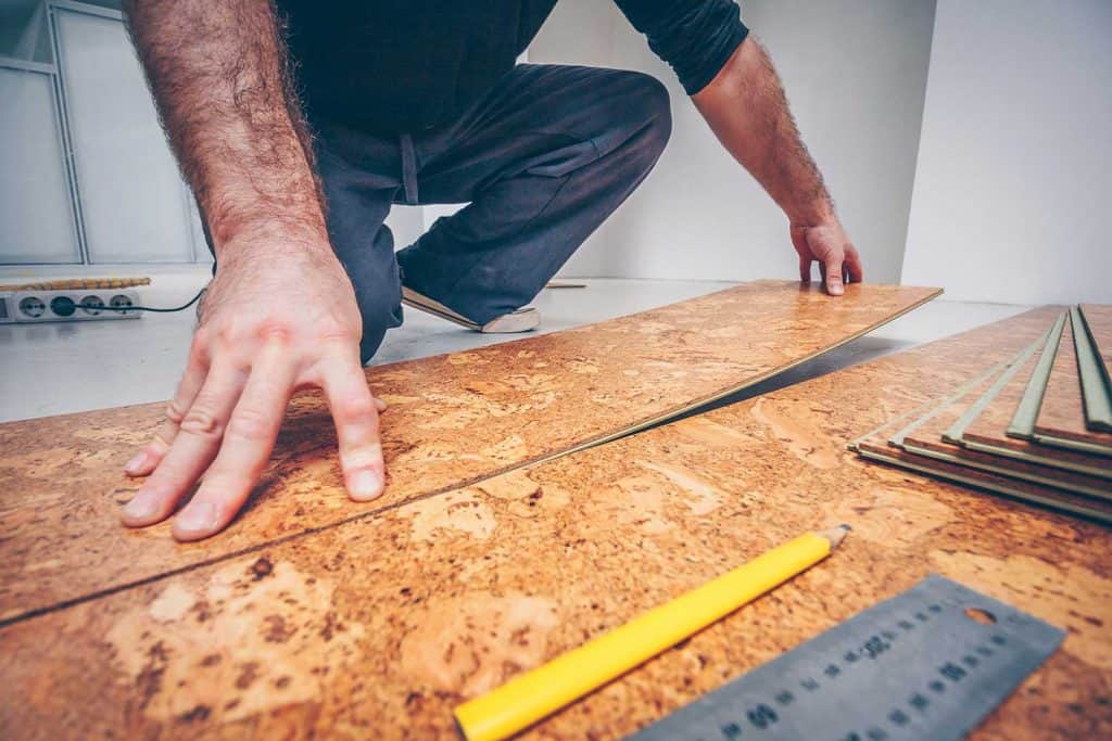 Master connects the cork flooring panels