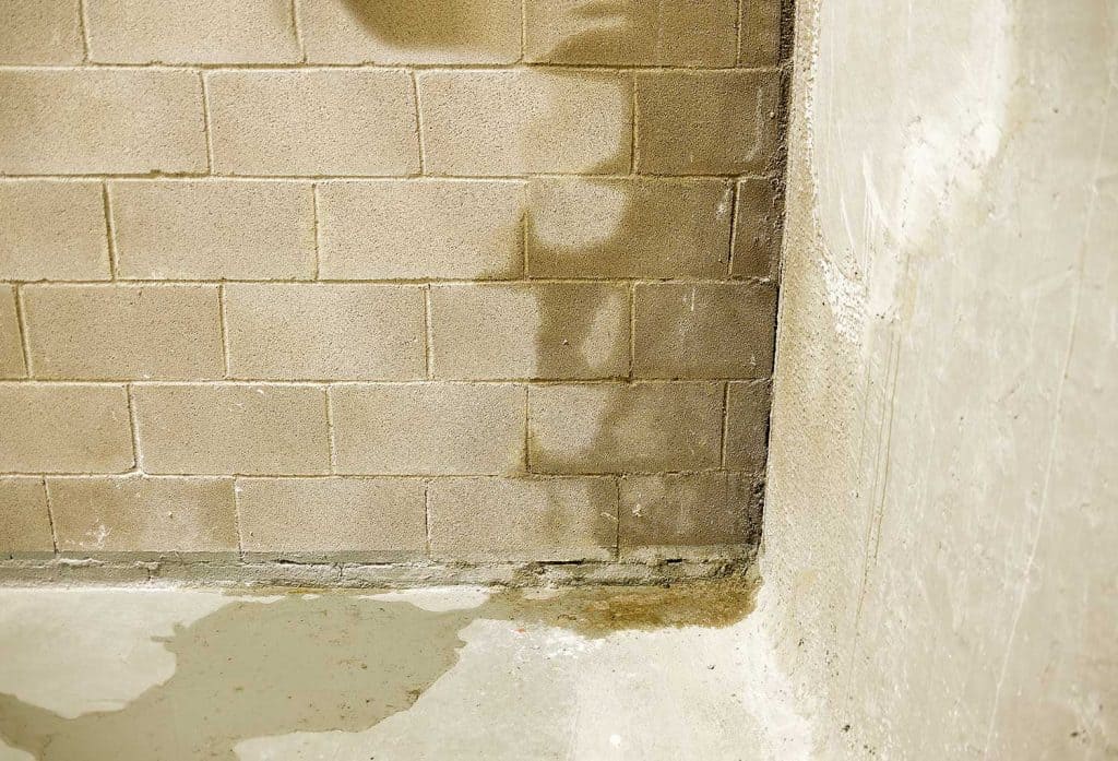 Rain water leaks on the wall causing damage