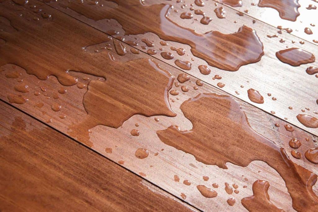 Water drops on wooden board