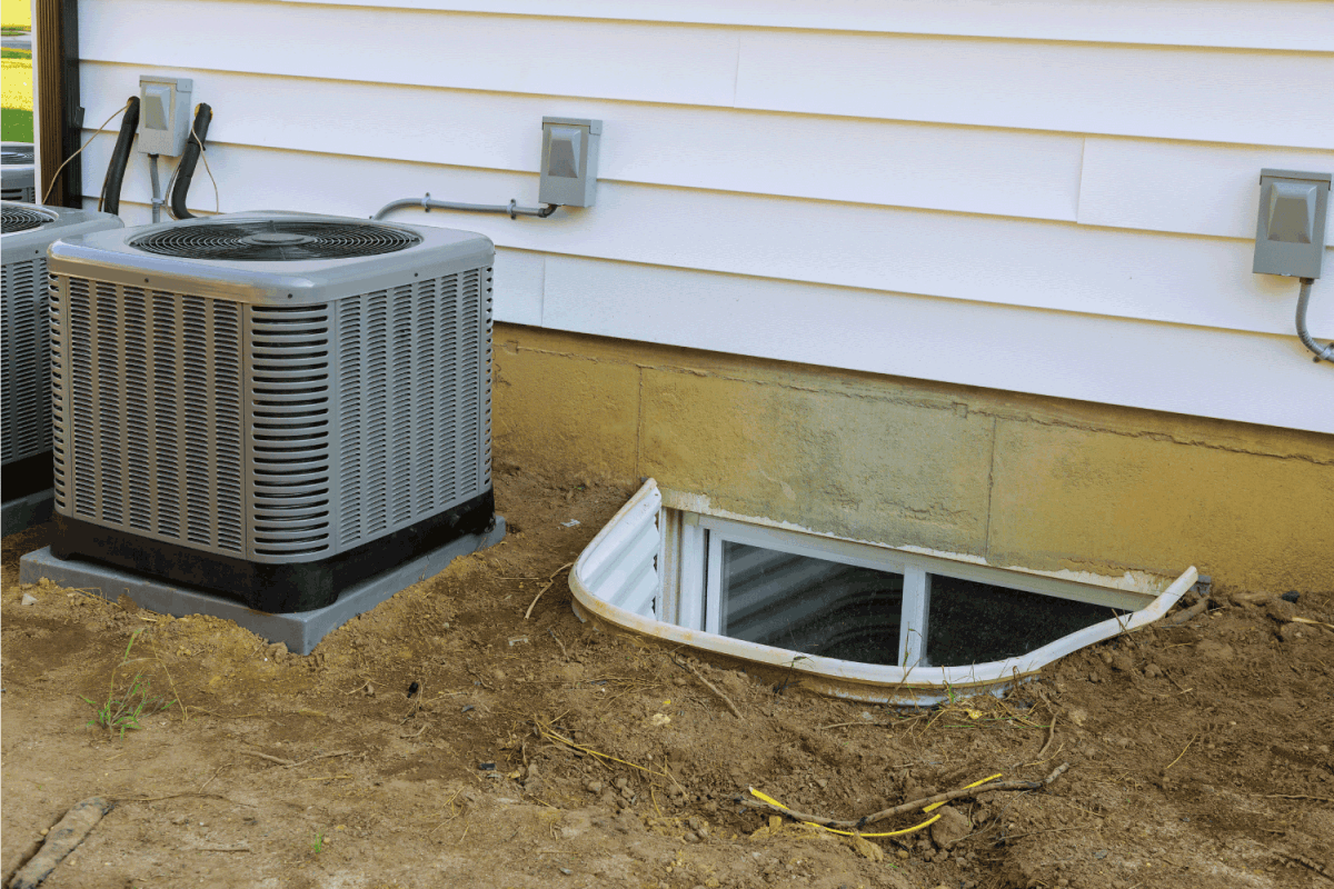 Air conditioning system assembled on performing preventive maintenance in a window well for basement