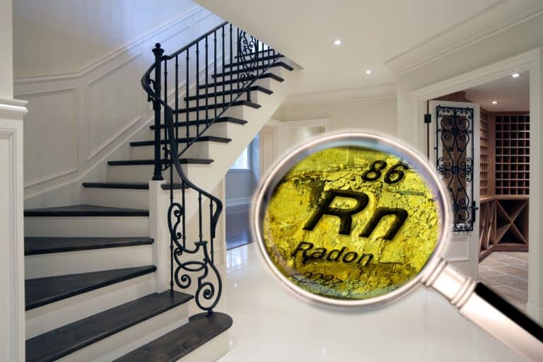 A photo of a basement with a magnifying glass showing radon, Can A House Without A Basement Have Radon?