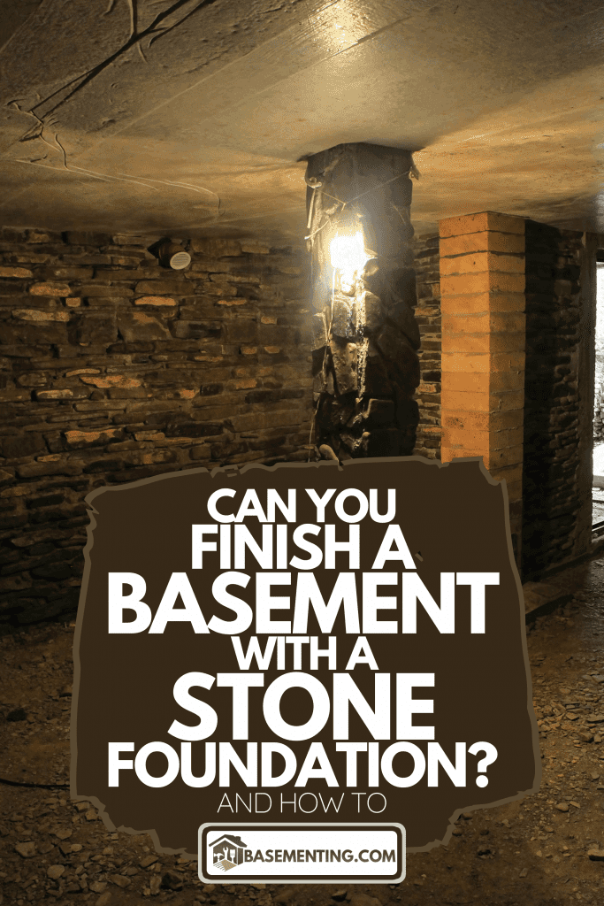 A dark basement with stone wall, Can You Finish A Basement With A Stone Foundation? [And How To]