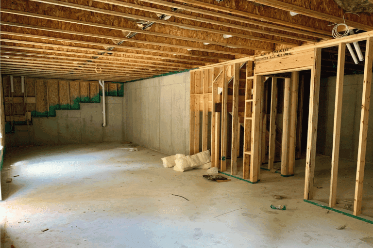 Unfinished basement with wood and cement. Can I Add A Sub-Basement To An Existing Basement What To Consider