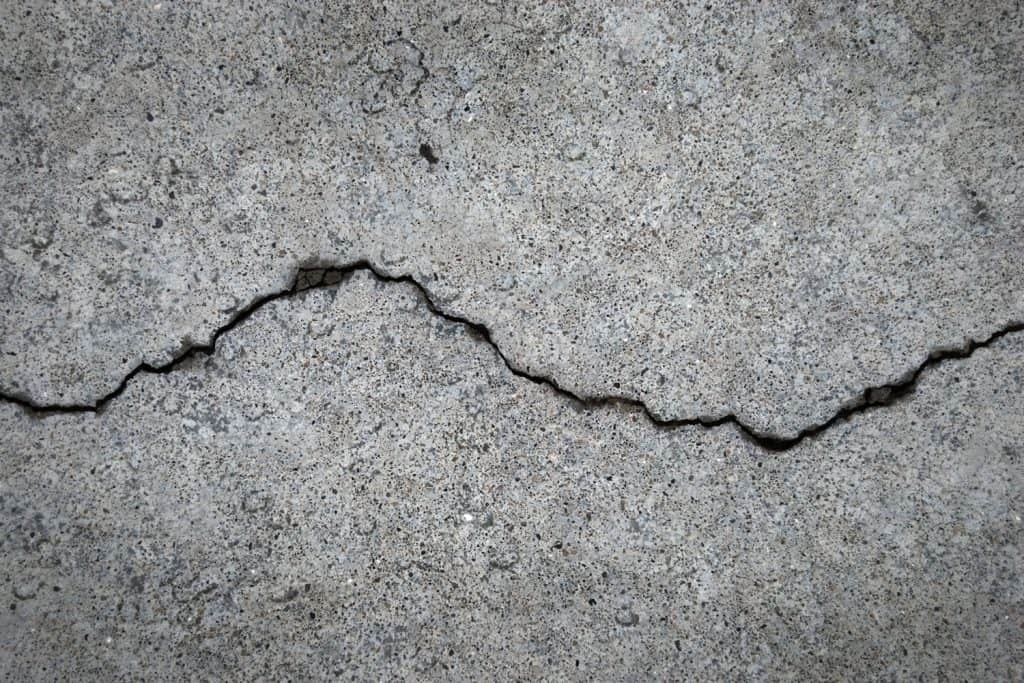 A huge crack in the basement flooring