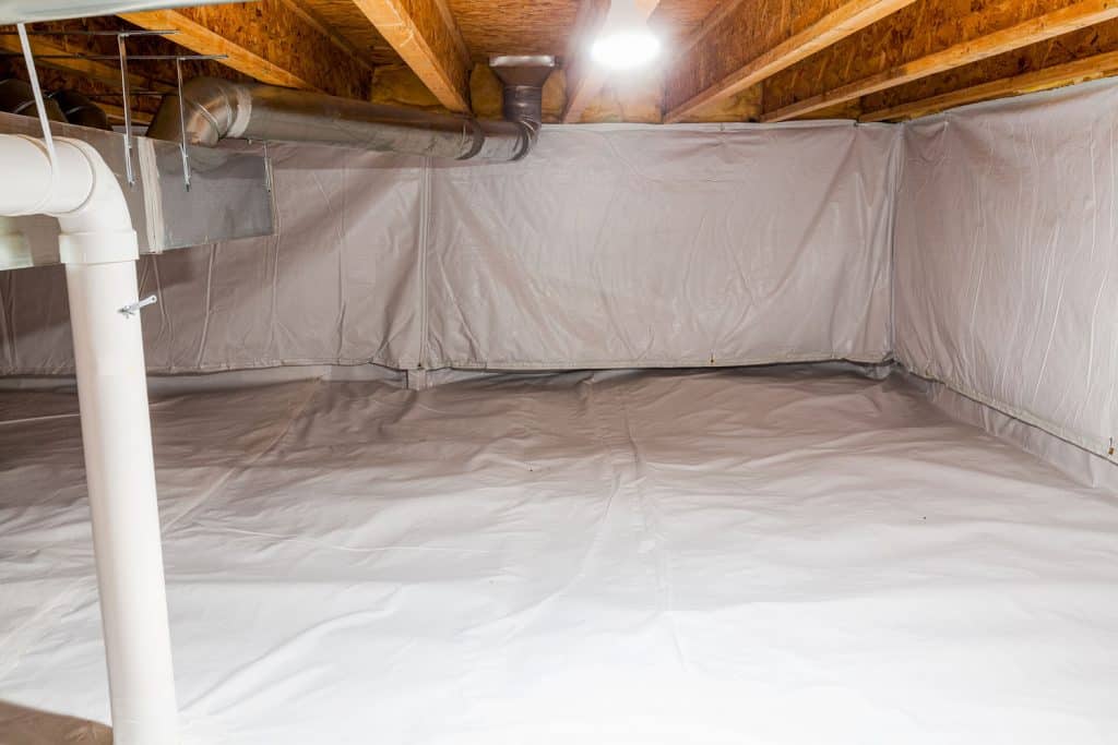 Crawl space fully encapsulated with thermoregulatory blankets and dimple board.