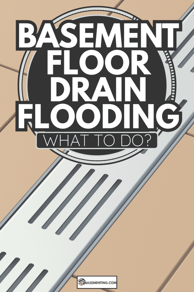 Long rectangular shower drain with stainless grid on basement floor with ceramic tiles. Basement Floor Drain Flooding—What To Do