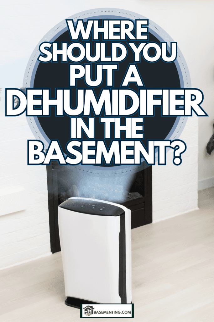 A small dehumidifier placed near the fireplace in the basement, Where Should You Put A Dehumidifier In The Basement?