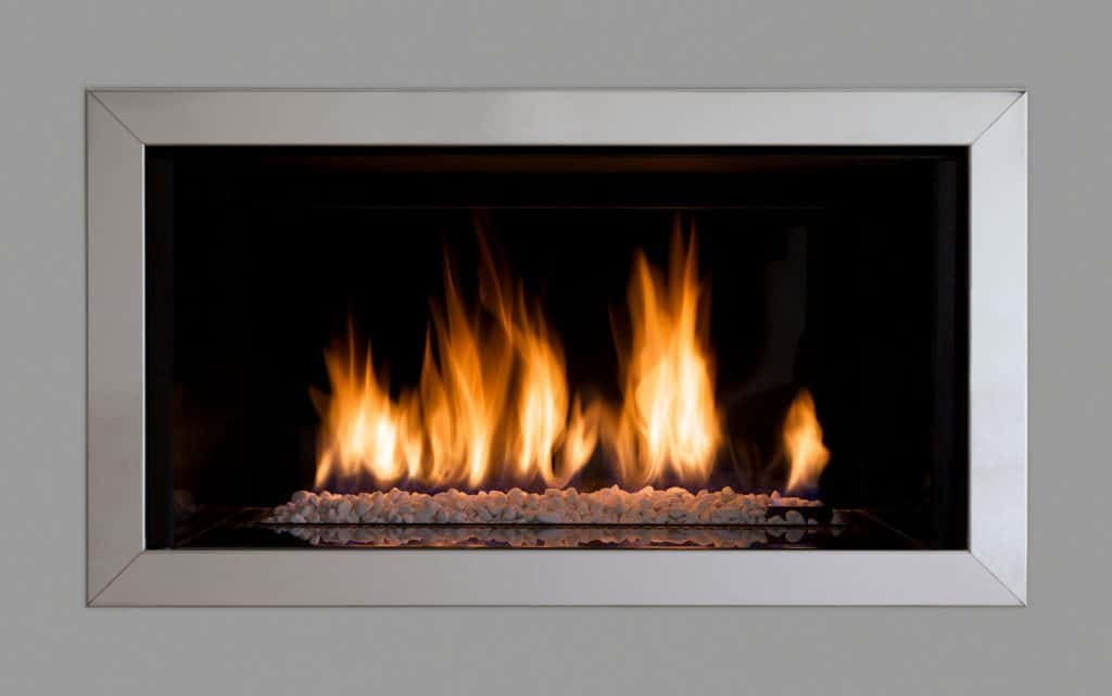 a-modern-gas-fire-with-a-stainless-steel-surround-fitted-in-a-grey-coloured-wall-in-a-luxury-new-home