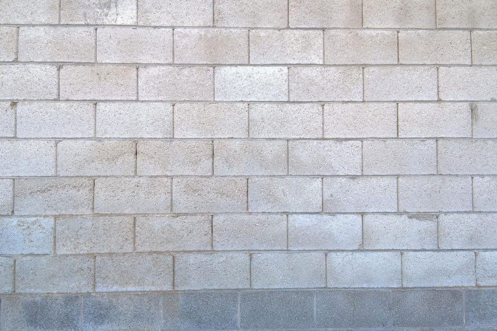 A tall cinder block wall