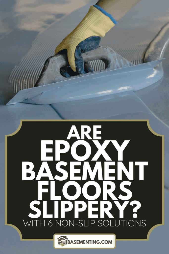 Worker applies gray epoxy resin to the new floor, Are Epoxy Basement Floors Slippery?[With 6 Non-Slip Solutions]