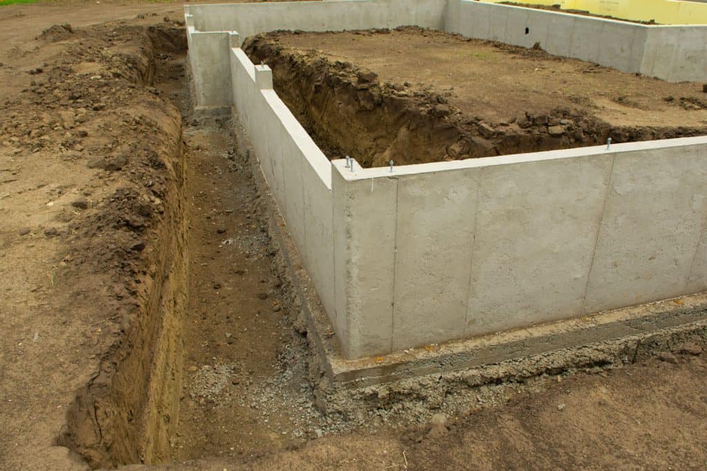 Concrete footings and basement walls finished ready for next phase of new home construction.