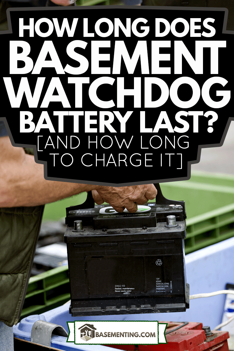 A man holding watchdog battery, How Long Does Basement Watchdog Battery Last? [And How Long To Charge It]