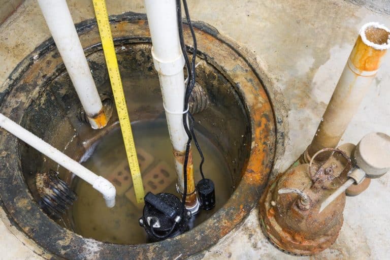 Installation of a new sump pump and the removal of the old obsolete rusty one, Do Walkout Basements Need A Sump Pump?
