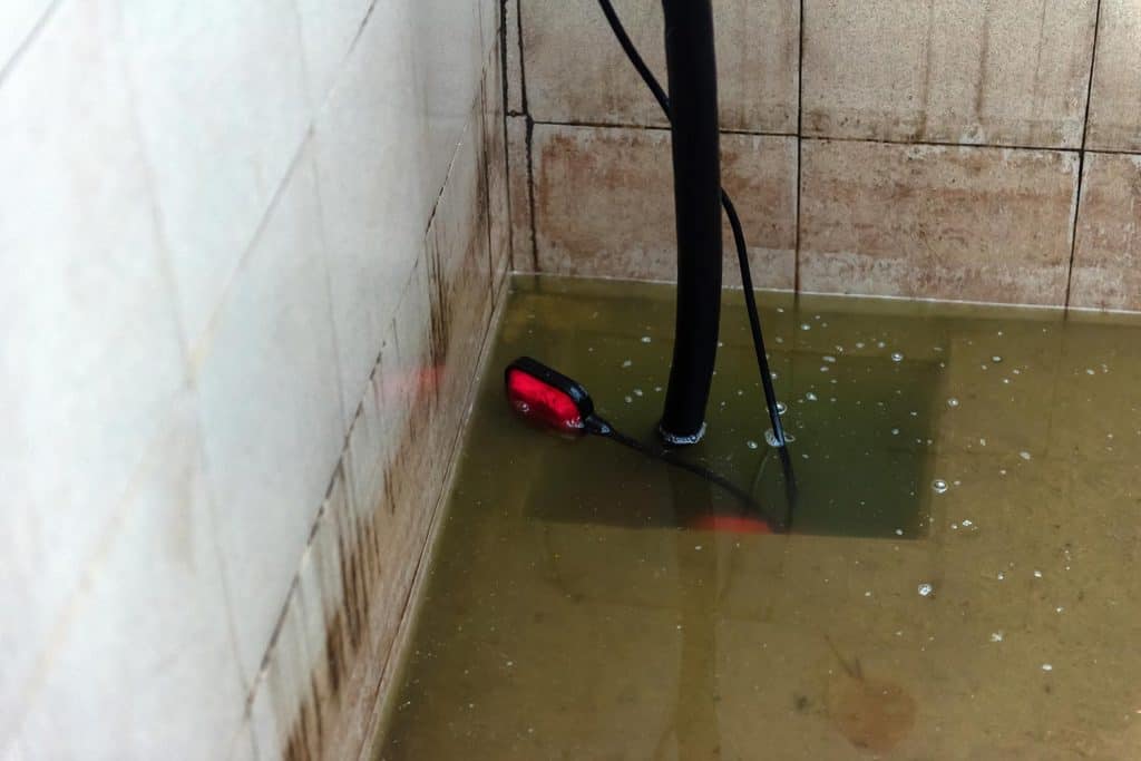 The drain pump in a dirty water pool