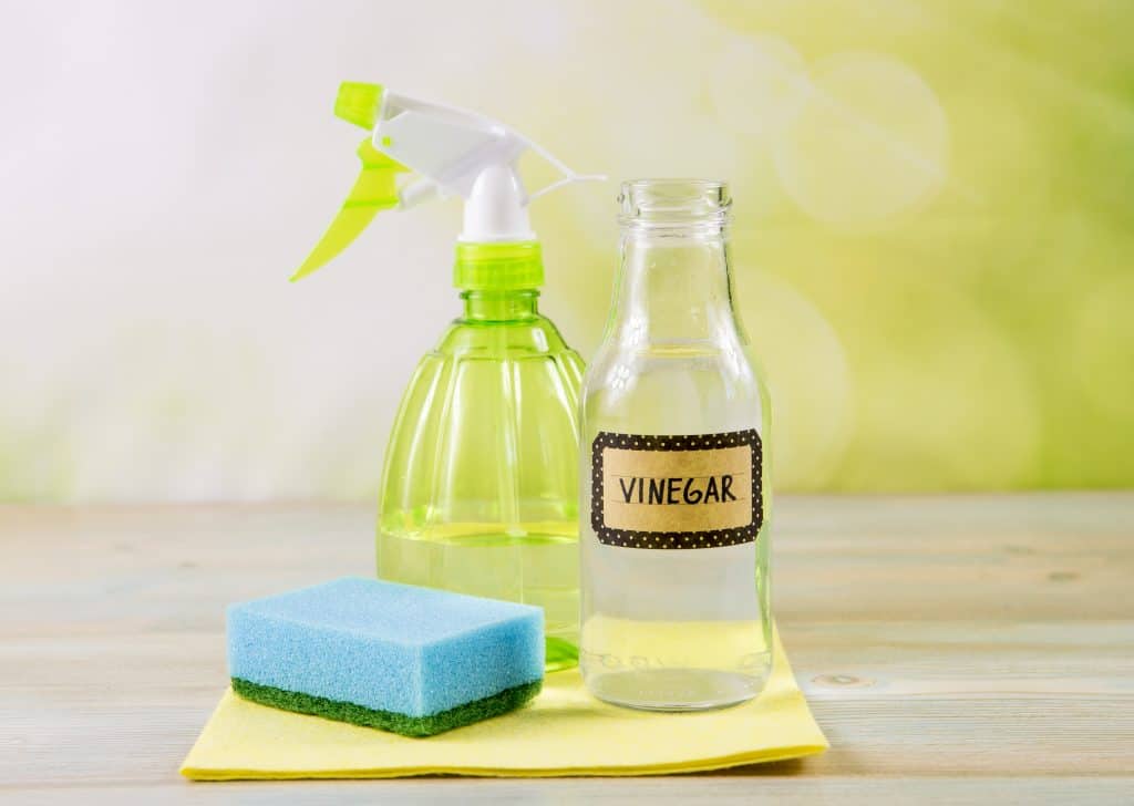 Using natural destilled white vinegar in spray bottle to remove stains