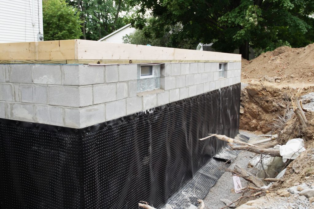 A suburban residential construction site new basement foundation 